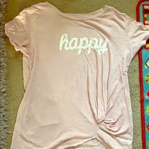 Shirt that says happy it is tied on the side